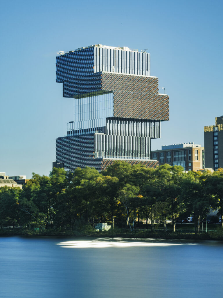 A view of shifted shape of the CDS building from across the Charles River. The weather is a bright and blue, but stiff mid-day noon in October. Photo by Bob O'Connor for Boston University Photography.